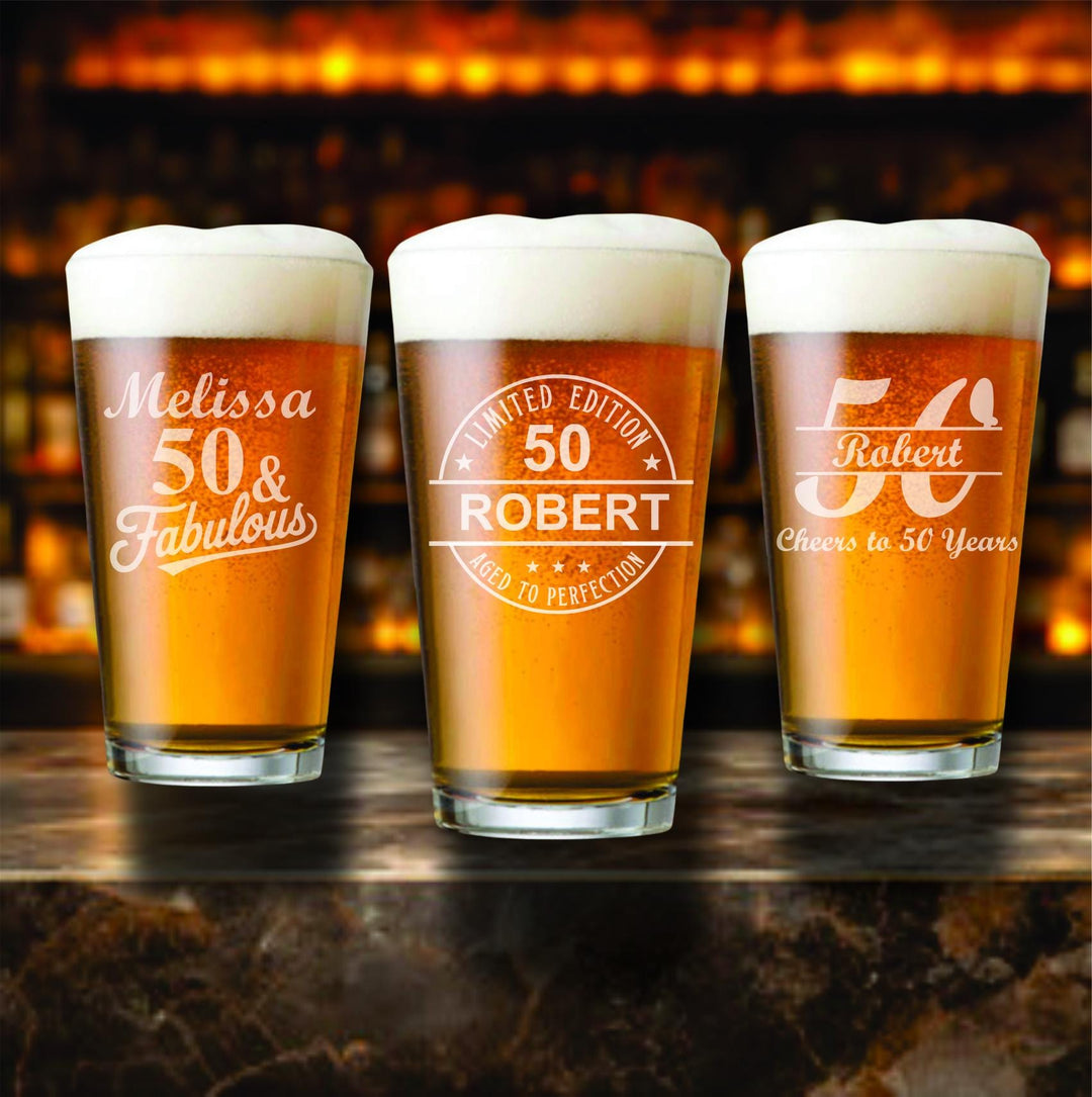 50th Birthday Pint Beer Glass Favors – Aged to Perfection Personalized Beer Glasses – Premium Engraved 50th Birthday Party Favor- 12 pc Set